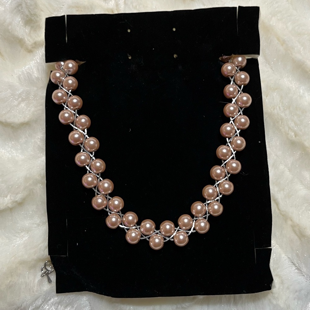 Brand new light, champagne glass pearl necklace braided style
